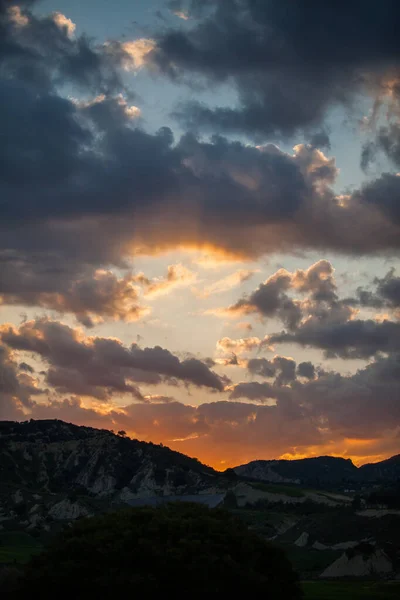 stock image sunset sky above the hills