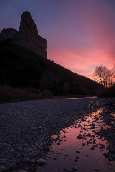 stock image mountain peaks at purple sunset