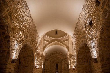 Stone walls of the nave of a church restores