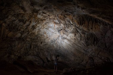 large central chamber of the cave with columns of stalactites and stalagmites
