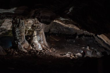 large central chamber of the cave with columns of stalactites and stalagmites