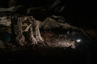 large central chamber of the cave with columns of stalactites and stalagmites