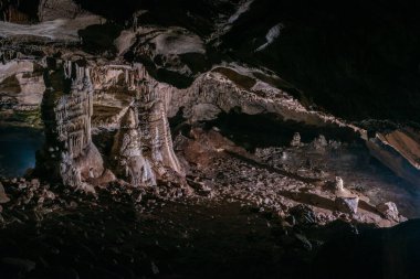 large central chamber of the cave with columns of stalactites and stalagmites