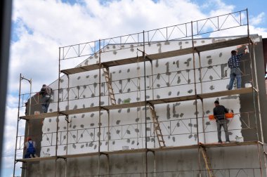 The outer walls of the house are insulated with foam