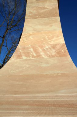 Split and processed red natural stone is used in construction