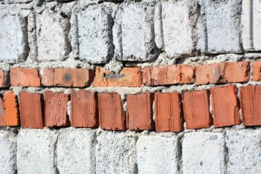 A fragment of the masonry wall of the building