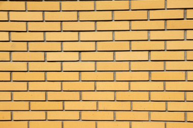 Bir tuğla duvarın dekoratif bir parçası.