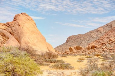Beautiful view of Spitzkoppe bald granite peaks located between Usakos and Swakopmund in the Namib desert of Namibia