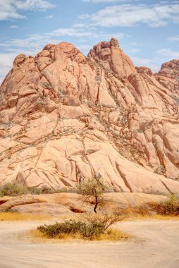 Beautiful view of Spitzkoppe bald granite peaks located between Usakos and Swakopmund in the Namib desert of Namibia