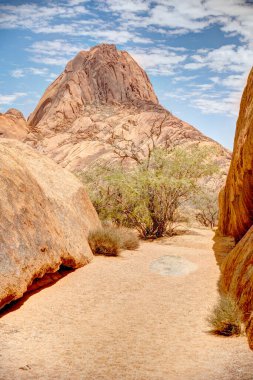 Beautiful view of Spitzkoppe bald granite peaks located between Usakos and Swakopmund in the Namib desert of Namibia
