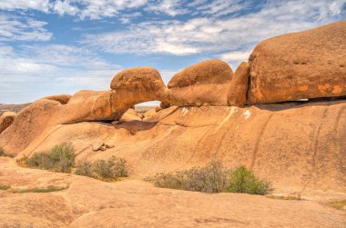 Beautiful view of Spitzkoppe bald granite peaks located between Usakos and Swakopmund in the Namib desert of Namibia