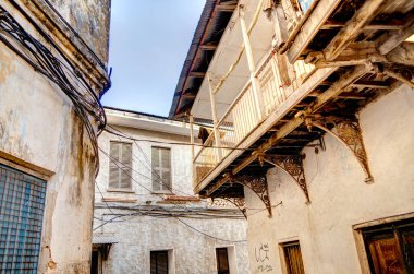 Stone Town, Zanzibar, Tanzanya - Ocak 2023: Güneşli havada tarihi simgeler