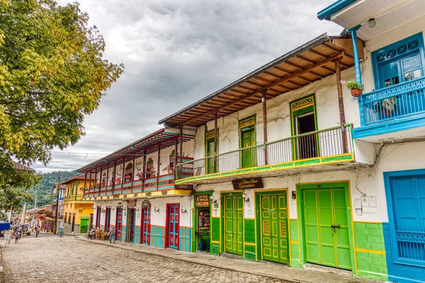 stock image Jardin, Colombia - May 2019: Vintage colorful colonial houses in the street of Jardin, Colombia