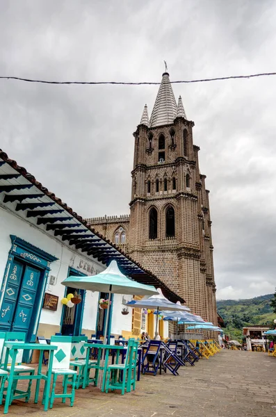 stock image Jardin, Colombia - April 2019: Colorful facades of colonial houses in Jardin, Colombia, showcasing the town's rich architectural heritage.