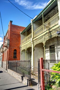 Melbourne, Avustralya - 1 Ağustos 2023: Bulutlu havada tarihi şehir merkezi, HDR resmi