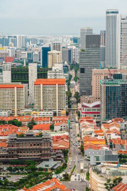 Singapur - Temmuz 12023: Bulutlu havada şehir silueti, HDR Görüntü