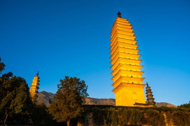 Dali, China - December 1, 2023 : View of Three pagodas temple in Dali, HDR Image clipart