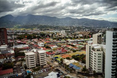 San Jose, Costa Rica - January 1 2023 : Cityscape in cloudy weather, HDR Image clipart