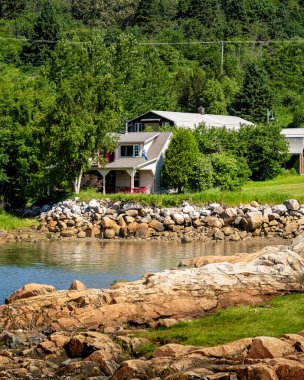 Port au Persil, Quebec, Canada - June 23 2024 : Picturesque village in summertime, HDR Image clipart