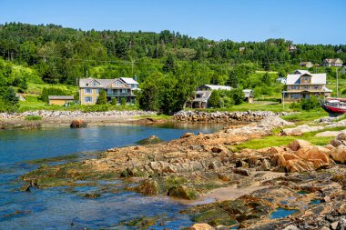 Port au Persil, Quebec, Canada - June 23 2024 : Picturesque village in summertime, HDR Image clipart