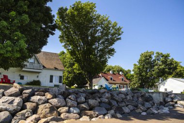 Ile d'Orleans, Quebec, Canada - June 23, 2024: Picturesque rural place in summertime, HDR Image clipart