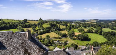 View of old stone buildings at village of Laguiole, Aubrac, France. clipart