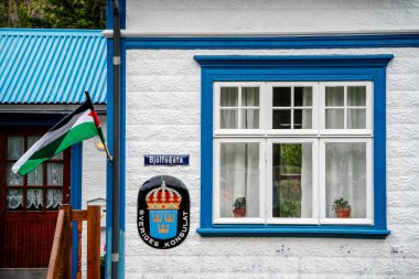 Seydisfjordur, Iceland - July 2 2024 : Historical village in cloudy weather, HDR Image clipart