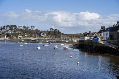 Le Conquet, France - March 03, 2024: Scenic view of the port city during sunny weather clipart