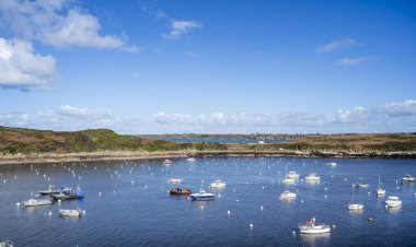 Le Conquet, France - March 03, 2024: Scenic view of the port city during sunny weather clipart