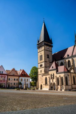 BARDEJOV, SLOVAKIA - May 27, 2024: Scenic view of old city during sunny weather clipart