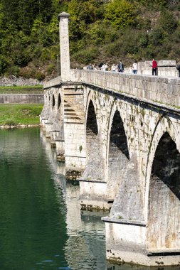 Visegrad, Bosnia and Herzegovina - September 2, 2024 : Historical town on the Drina River, HDR Image clipart