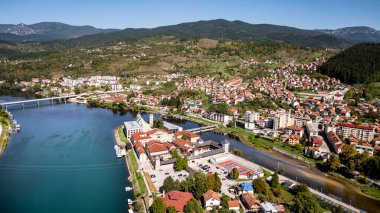 Visegrad, Bosnia and Herzegovina - September 2, 2024 : Historical town on the Drina River, HDR Image clipart