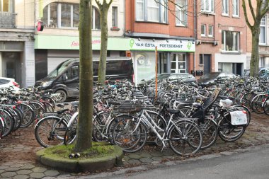 Many bicycles near Gent Sint-Pieters station in Ghent, Belgium clipart