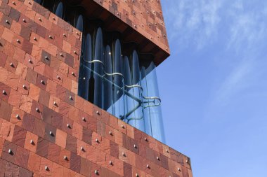 Close up detail of modern museum Aan de stroom (MAS) in Antwerp. Selective focus.  clipart