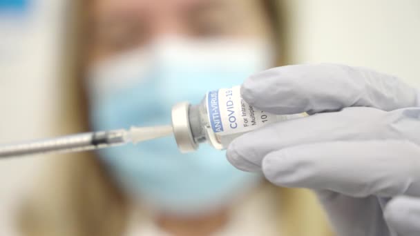 Close Shot Female Healthcare Worker Filling Syringe Covid Vaccine Vial — Stock Video