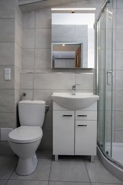 Simple cheap small bathroom in the apartment