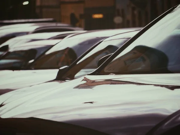 stock image Cars parked at city street during day 