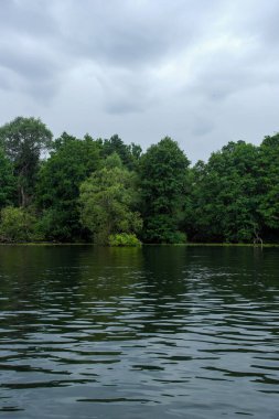 Scenic view of lake against cloudy sky 