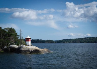small lighthouse on an island in the archipelago