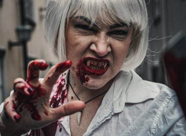 Close up of a bloody female vampire 