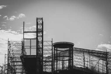 Low angle view of construction site against sky