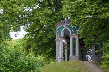 Old building in a park during summer 
