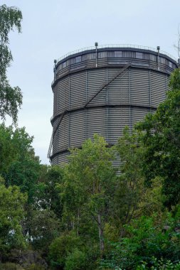 Low angle view of a old gas holder