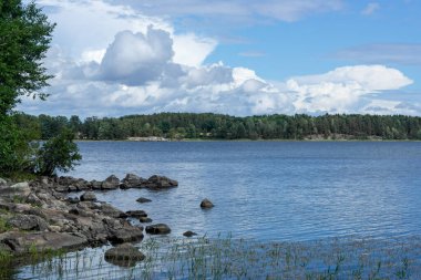 Scenic view of a lake against sky during summer 