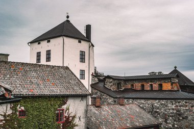 High angle view of old buildings against sky