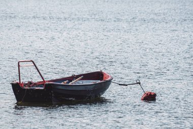 view of a boat moored in sea during summer 