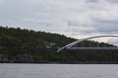 A modern bridge over the river during summer 