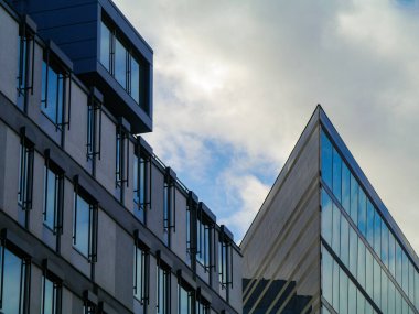 Low angle view of modern buildings against sky
