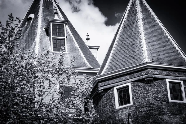 stock image Low angle view of two brick towers 