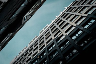 Low angle view of modern buildings against sky 